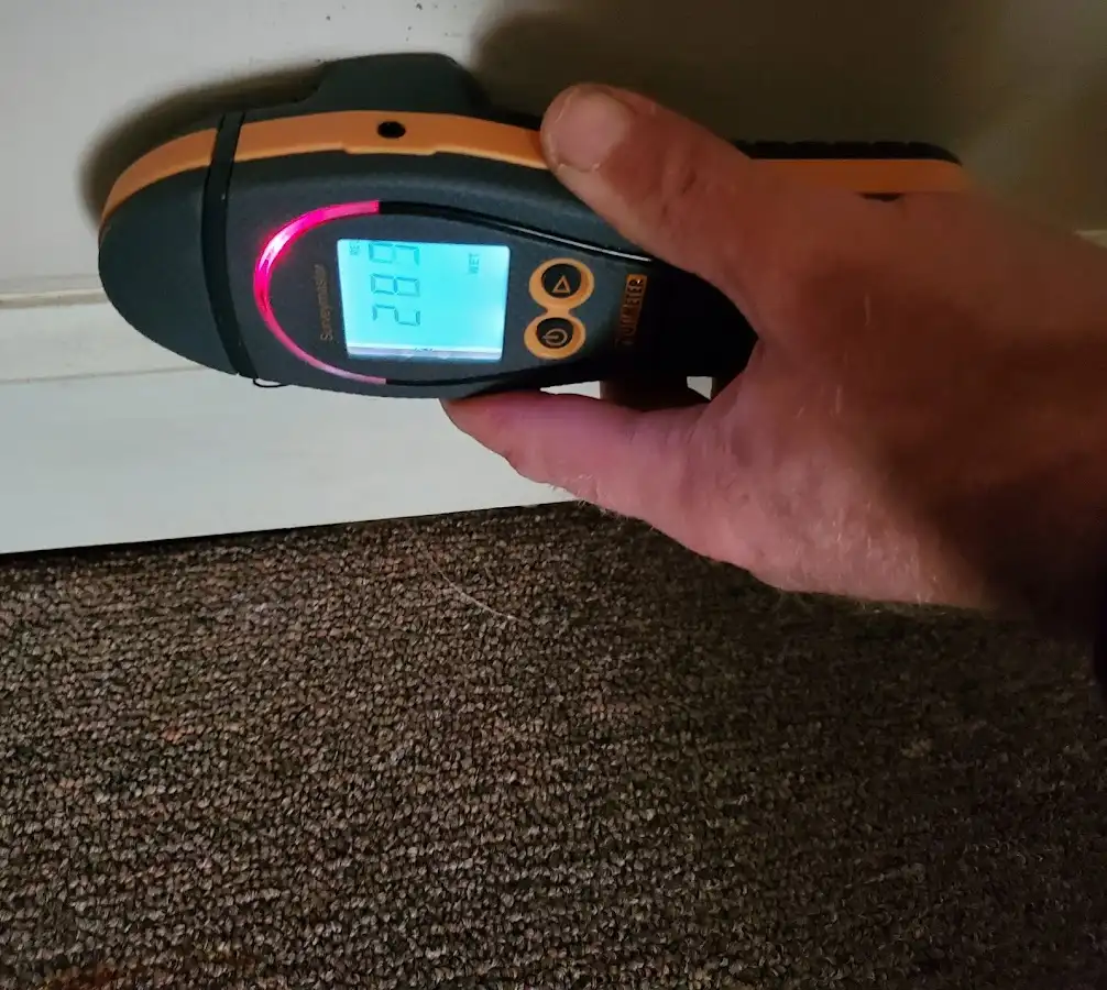 Moisture detection at baseboard during Storm Damage Restoration in Gatesville